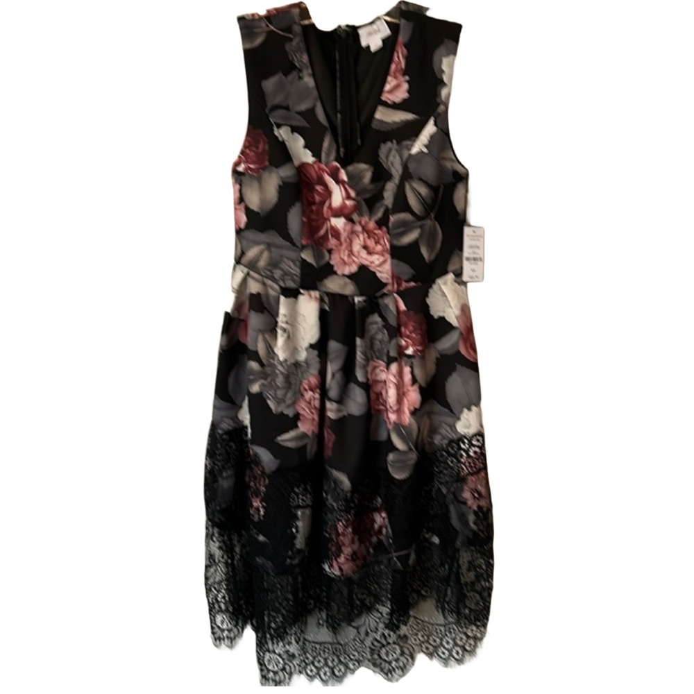 NWT Sleeveless cocktail dress with lace bottom.
